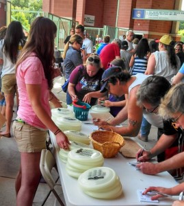 NECA-IBEW Electricians distributed glow-in-the-dark Frisbees to fans attending the opening day game. Each contained the names of member contractors.