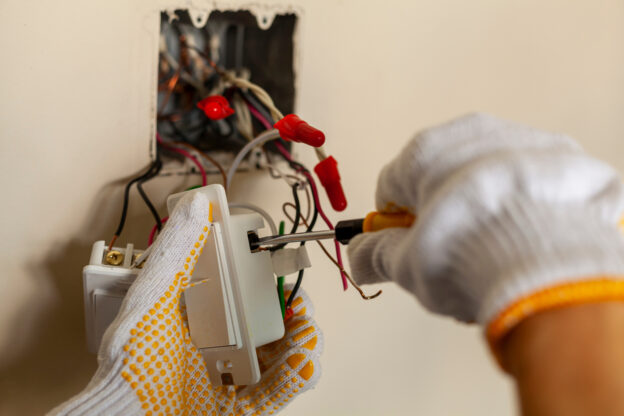 electrician installing an outlet