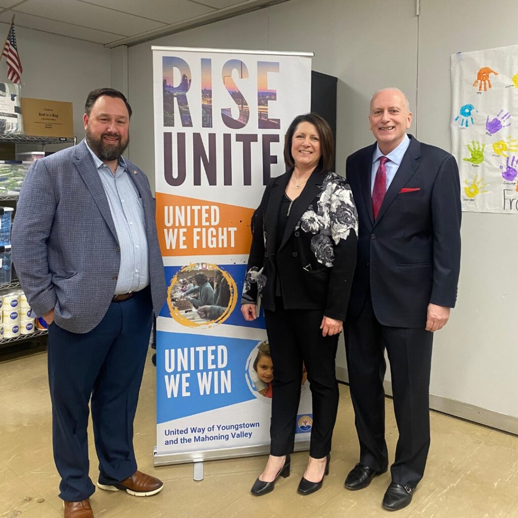 Eric Carlson and Bethany Carlson with Bob Hannon, president of United Way of Youngstown and the Mahoning Valley following the record 2023 campaign.