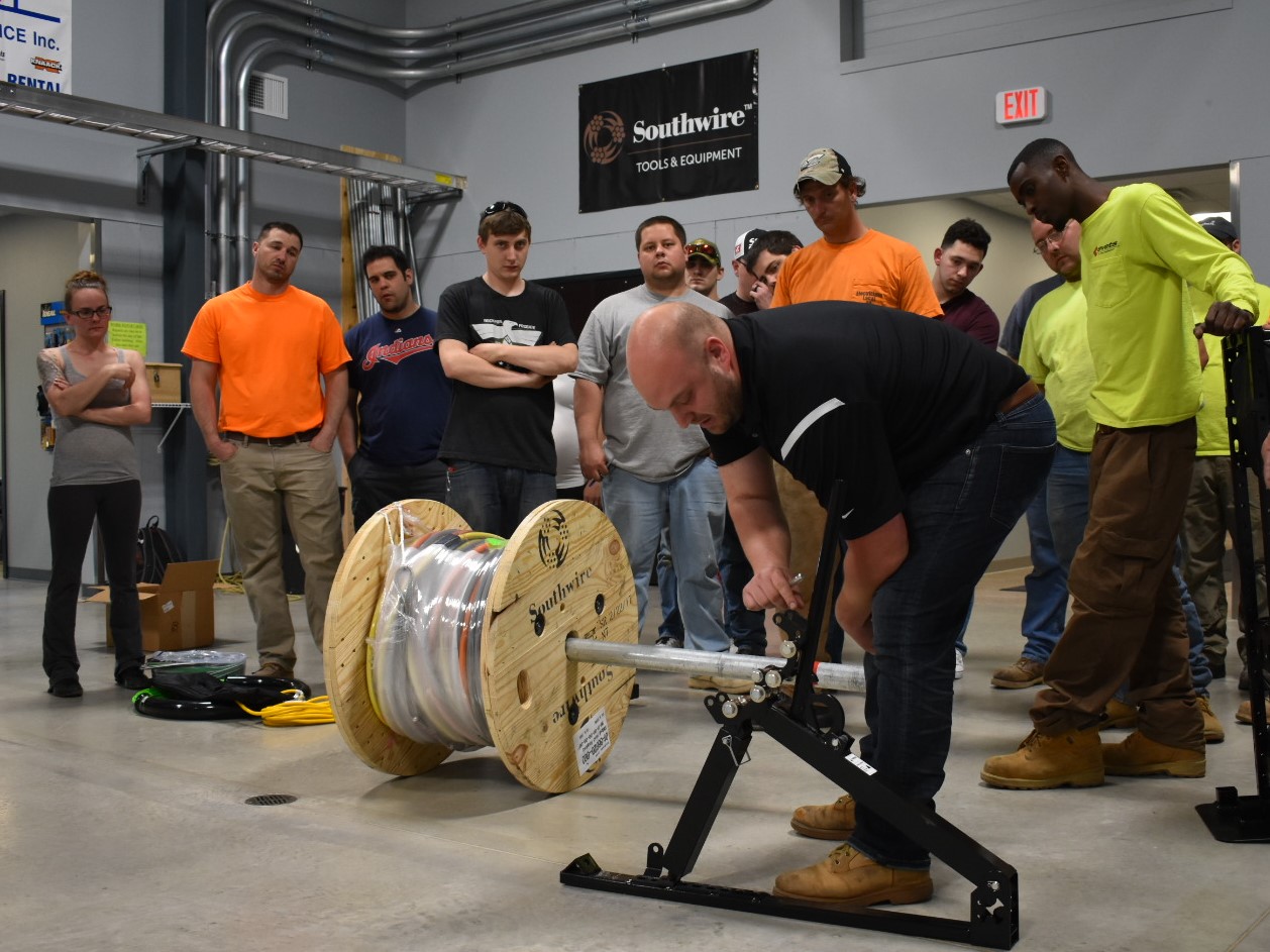 instructor teaching apprentices