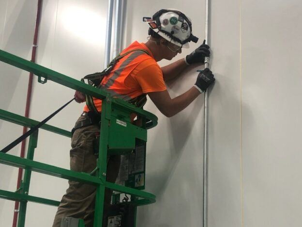 Electrician working at Ultium Cells early on in the project.