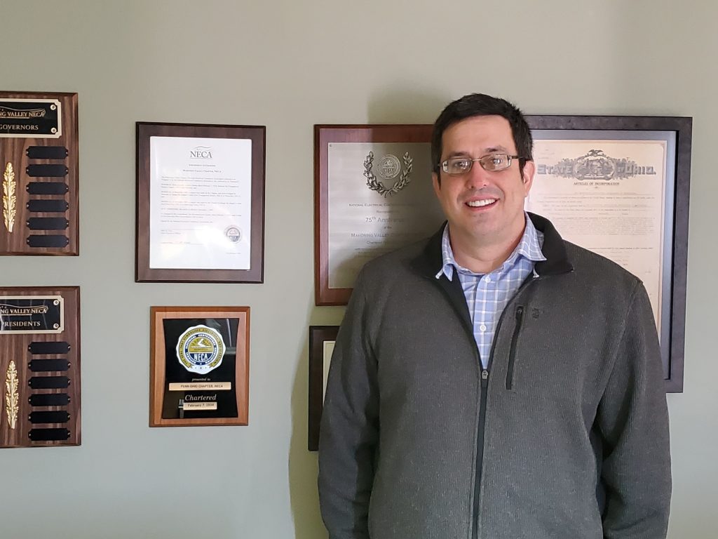 Tom Lipka stands in office.