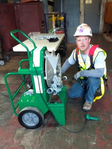 Ryan Tice working on an electrical project.